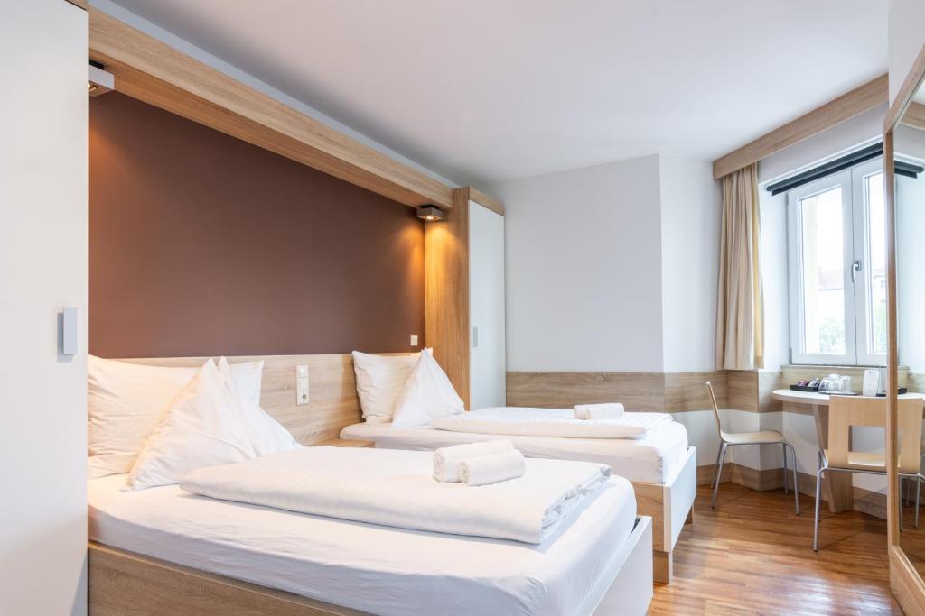 Modernes Doppelzimmer im Hotel Strasser